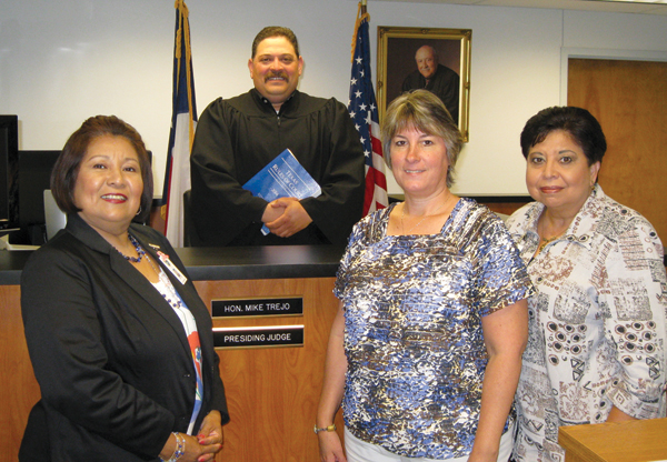 Judge Mike Trejo and office staff. Photo: Bill Keltner/LFN.