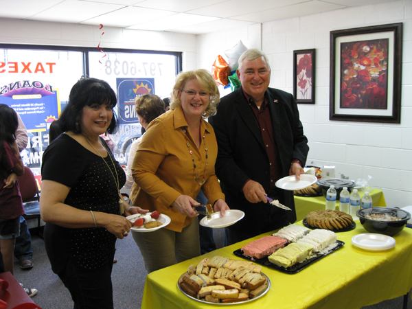 City Secretary Olga Oberwetter, Mayor Pro-Tem Lori Weaver and Mayor Steve Brewer enjoy the sweets and treats.