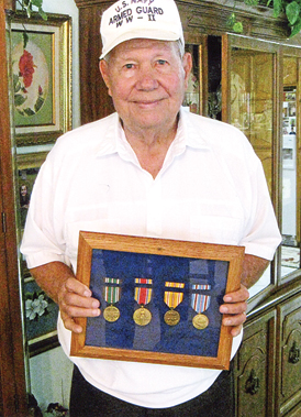 Seaman Humphrey with a few of his service medals. Photo: Bill Keltner/LFN