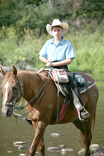 Colton Hughes, 12, enjoyed his vacation prize by crossing the Colorado River in the Rocky Mountains at the Bar Lazy J Guest Ranch August 18-24. For this year’s opportunity to win this vacation, children can enter the RGV Children’s Arts Festival. There is no entry fee. For details, get information at   www.KidsTalkAboutGod.org.