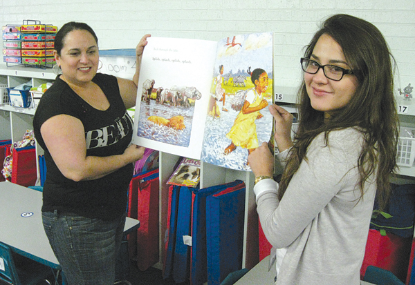 Volunteer Parent Mary Agado and Santa Rosa teacher Kristel Tijerina teach Head Start children.
