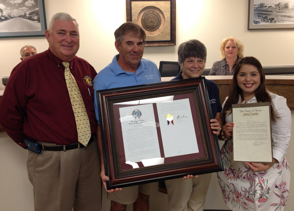 John and Ruth Dearinger of VIP- La Feria RV Park are presented with a resolution in honor of being chosen the Medium RV Park of the Year by the Texas Recreational Association. Standing with the Dearingers are La Feria Mayor Steve Brewer (left) and Michelle Lee Villarreal, Legislative Director for the Office of  State Representative Oscar Longoria. Photo: Cayetano Garza Jr./LFN