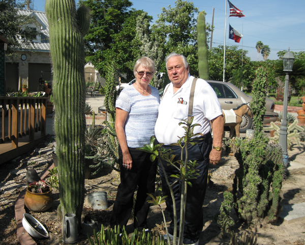 James D. (J.D.) Foster and his wife, Laureta, in their front yard cactus garden enjoying life in La Feria.  Photo: Bill Keltner/LFN