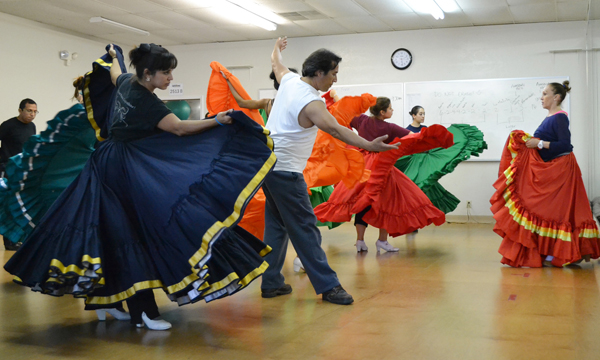 At left, Amalia Viviana Bastanta Hernández, daughter of Amalia Hernández who founded of the Ballet Folklórico de México, instructs a master class workshop held on Nov. 23, 2013 at South Texas College’s Pecan Plaza Wellness Center in McAllen.