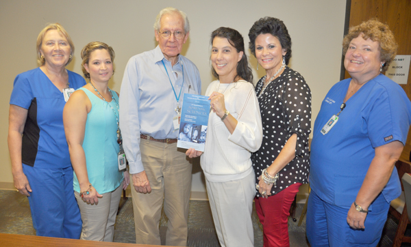 Discussing plans for the RGV Seminar in Forensic Sciences are Pat Palomo, RN, of the Valley Baptist Nursing Education Dept.; Melanie Machen, Executive Assistant at Valley Baptist-Harlingen; Dr. Stan Fisch, Pediatrician and Medical Director of the Child to Adult Abuse Response Team at Valley Baptist; Stephanie Hamby of the Valley Baptist School of Vocational Nursing; Marina Yzaguirre of the Texas Department of Family and Protective Services; and Marcia Fuller, MHAN, BSN, CEN, CPEN, Education Specialist with Valley Baptist. 