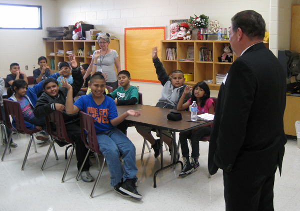 Students ask Trejo about his work as Justice of the Peace.