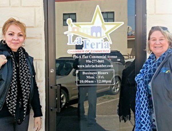 Secretary Reva Ayala (right) and Social Media Administrator Alma Martinez (left) stand in front of the brand new La Feria Chamber of Commerce offices located at 126-A East Commercial Ave. in La Feria.