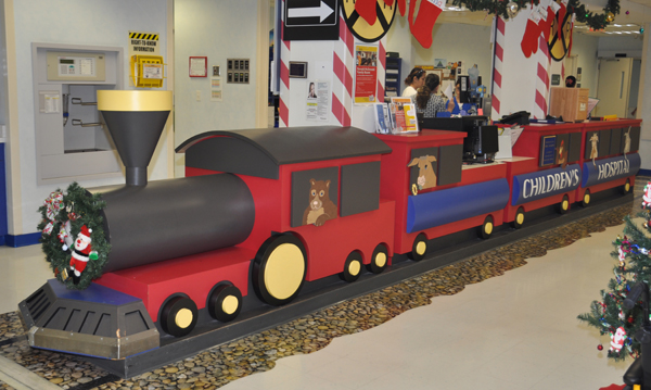 The Matt & Patty Gorges Children’s Center at Valley Baptist Medical Center in Harlingen is brightly decorated in themes which appeal to children.   For example, this nursing station is depicted as a toy train.  