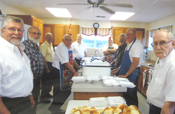 Volunteers for the big Valentine’s Day Bash:  (l-r)  Roger Allen, Carl Thompson, Wally Engelkes, Don Starcher, George Hansen, Mike Athon, Larry Allen, Bob Lutz, and Charlie Cruse. 