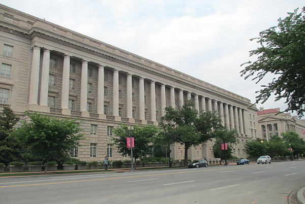 The Internal Revenue Service (pictured) will not collect up to $600 billion from dozens of U.S. multinationals using tax havens, according to a new report. At the end of 2014, 304 Fortune 500 companies collectively held $2.15 trillion in countries like Bermuda, the Cayman Islands, and the Bahamas. Photo: Joshua Doubek/Wikimedia Commons.