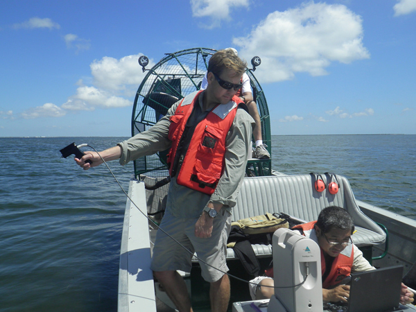 Dr. Michael Starek(left), Assistant Professor with Science and Engineering, and Dr. Lihong Su, Associate Research Scientist at HRI who works with Endowed Chair Dr. James Gibeaut. at Redfish bay, mapping sea grass. Photo: Flickr/Texas A&M University-Corpus Christi