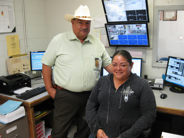 Police Chief Don Garcia and Dispatcher Eliza Mendez at Emergency Command Center.