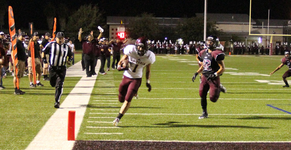 Brandon Perez scoring one of the touchdowns on the night.  