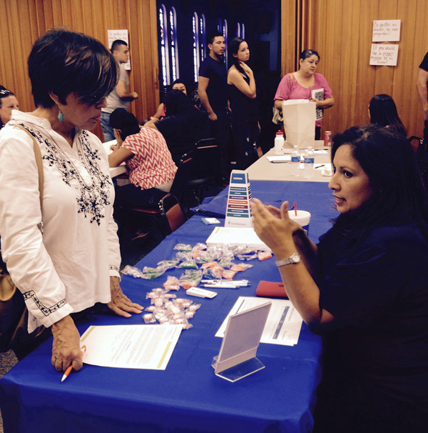 A United Healthcare representative speaks to an interested participant at last year’s Job Fair. Photo: Andi Atkinson/MMA.