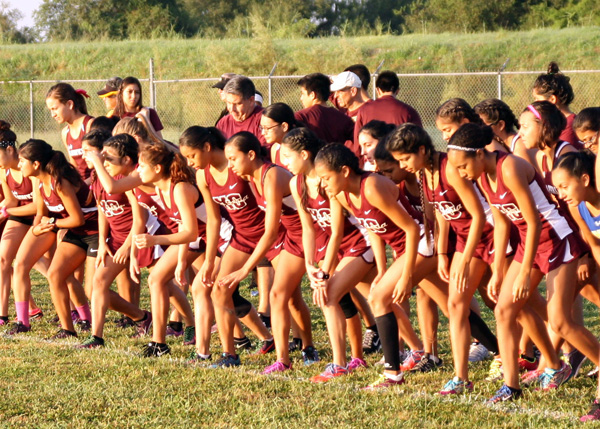 The varsity girls start their race.