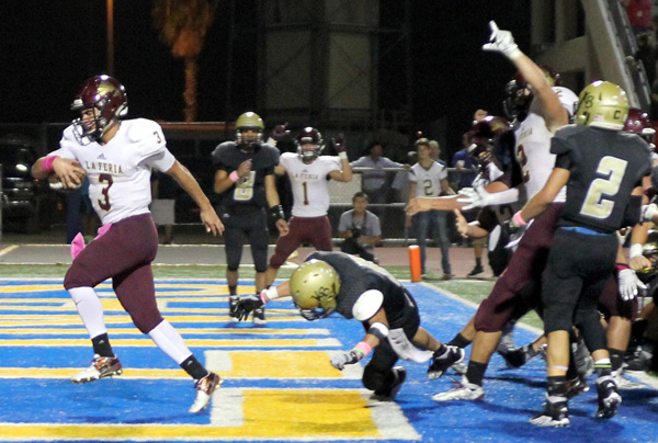 Quarterback Isaac Galpin rushes in for the touchdown.