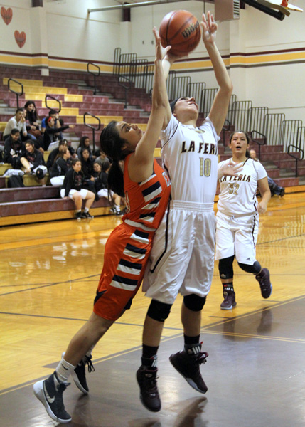 Bryssa Conde goes up for the layup.