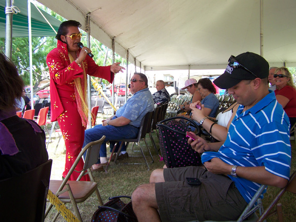 Luis Salazar Jr. from Laredo, Texas entertains the crowds at the annual Elvis Festival held at Little Graceland.