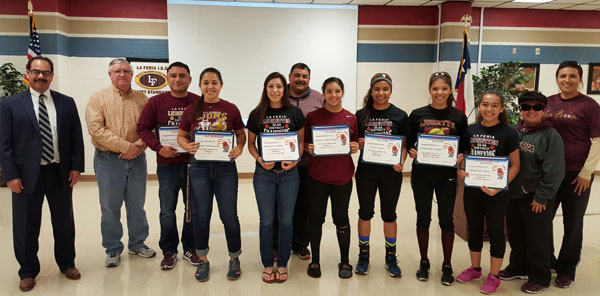 La Feria School Board President Alan Moore and La Feria Independent School District Superintendent Raymundo P. Villarreal, Jr. stand with La Feria High School students who were named to the 32-4A All District Girls Basketball Team and to the Team for their District Championship and their coaches. Photos: La Feria ISD