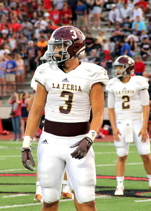 Hector Garza looks to the sideline for instructions