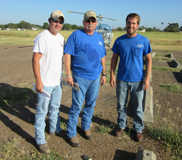 Boll Weevil Eradication team in La Feria: Helicopter ground crew: Steven Cavins and Chuck Bosler with pilot Jordan Knepp.
