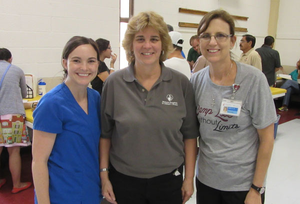 (l-r)  Melissa Howard,  Physical Therapist; Cathy Moniaci, Houston Shriner Hospital Administrator; Janet Dawson, Physical Therapist.