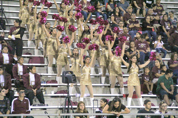 Gold Stars dance away as the Lions play. 