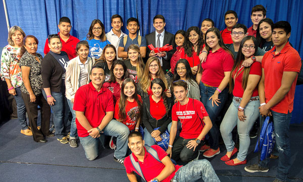Rio Grande City High School students posed with Albert Manero, executive director of Limbitless Solutions, during HESTEC Student Leadership Day on Tuesday, Oct. 4, 2016, on the UTRGV Edinburg Campus. Manero, back row center, holding the red robotic arm, delivered his keynote on “3D hope” to visiting students. UTRGV Photo by Paul Chouy