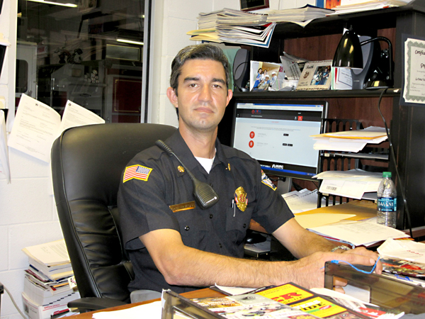 Chief Greg Hernandez at his command center.